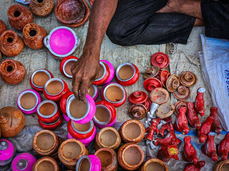 A colourful display of traditional Indian handicrafts at a craft market